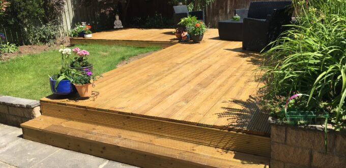 A generous sized L-shaped deck transforms the garden